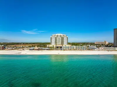 a view of a beach with buildings and the ocean at Origin 1605 - Two Bedroom - Partial Gulf View by Beach Haven Vacation Rentals in Panama City Beach