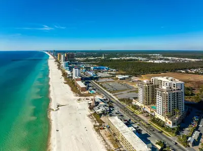 an aerial view of the beach and buildings at Origin 1231 - One Bedroom - Sunrise and Gulf Views by Beach Haven Vacation Rentals in Panama City Beach