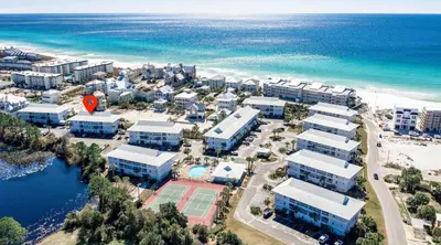 an aerial view of a resort next to the ocean at Beachside Villas 523 in Santa Rosa Beach