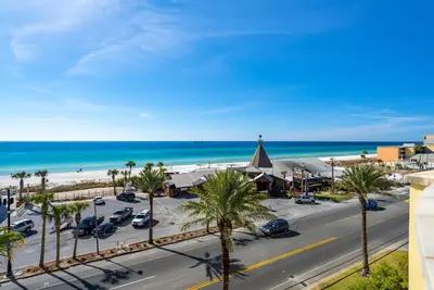 a view of a street with a church and the beach at Origin 613 - Studio King - Peaceful Nature View in Panama City Beach