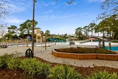 a park with a pool and a playground at Shores of Panama #421 by Book That Condo in Panama City Beach