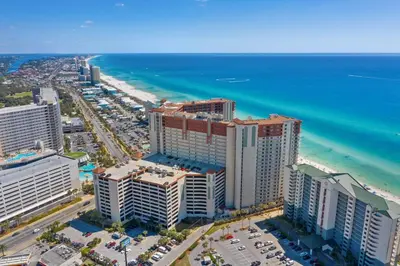 an aerial view of the beach and the ocean at Shores of Panama Beachfront 2nd Floor Unit 208! No elevators needed! in Panama City Beach