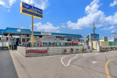a building with a street sign in front of it at It Doesn’t Get Any Better Than This! 2BR 2BA Sleeps 8 Beachfront! in Panama City Beach