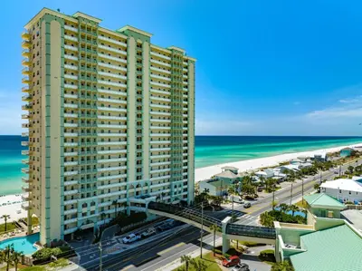 an aerial view of a tall building next to the beach at Celadon #0606 in Panama City Beach