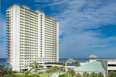 a large white building with the ocean in the background at Celadon 2005 by Emerald Coast Retreats in Panama City Beach