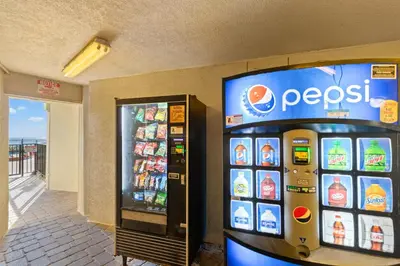 a pepsi soda machine in a convenience store at Commodore 0702 in Panama City Beach