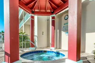 a hot tub in the middle of a building at Majestic Beach Towers 2-1703 by Emerald Coast Retreats in Panama City Beach