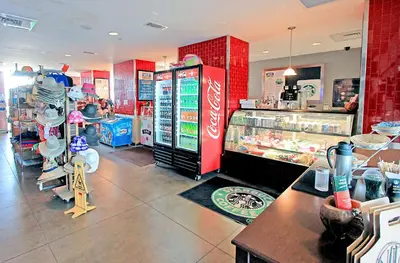 a fast food restaurant with a cocacola store at Majestic Beach Towers 2-1703 by Emerald Coast Retreats in Panama City Beach
