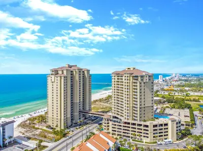 an aerial view of the beach and buildings at Grand Panama Beach Resort - Pet Friendly Condos by Panhandle Getaways in Panama City Beach