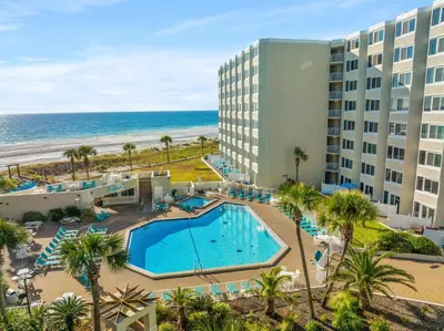 an aerial view of a resort with a swimming pool and the beach at Beach Front Ocean Front Condo Top of the Gulf 516 in Panama City Beach