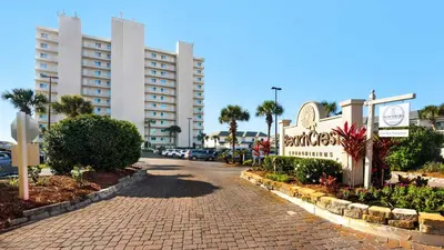 a street in front of a hotel with a building at BeachCrest 1202 in Santa Rosa Beach