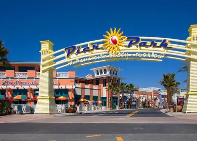 a large sign in front of a resort at Origins at Seahaven 1429 in Panama City Beach