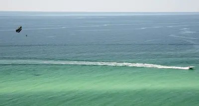 an aerial view of a boat in the water at Origins at Seahaven 709 in Panama City Beach
