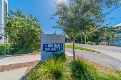 a sign for the parking lot at the domain sig bad emergency at Inlet Dunes 101 l Community Pool l Across From The Beach in Inlet Beach