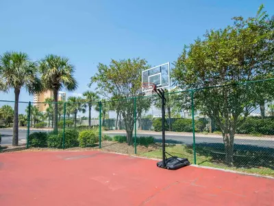 a basketball hoop with a net on a court at Dunes of Panama #D702 in Panama City Beach