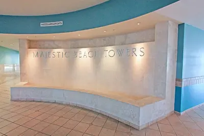 a sign for the masterchef beijing towers in a lobby at Majestic Beach Towers 1-1906 in Panama City Beach