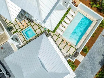 an overhead view of a swimming pool on a house at YOLO Cottage in Rosemary Beach