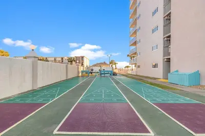 an empty basketball court in an apartment complex at The Summit 1132 - Beachfront Bliss Stunning 2BR in Panama City Beach