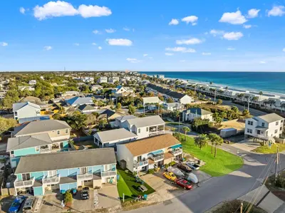 an aerial view of a coastal town with the ocean at Stay at The Salty Palm! 2BR 15BA Sleeps 7 in Panama City Beach