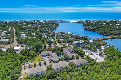 an aerial view of a resort with a body of water at Comfortable coastal house with roomy accommodations and easy shoreline access in Santa Rosa Beach