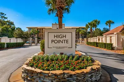 a sign for a high point with flowers at 2nd-floor condo with beach access pool tennis pickleball hot tub balcony in Seacrest