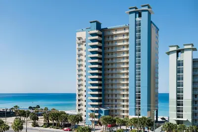 a view of two tall buildings next to the ocean at Grandview East 1204 in Panama City Beach