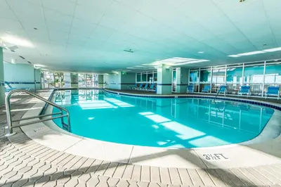 a large swimming pool in a large building at Majestic Beach Towers 2-2003 in Panama City Beach