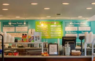 a fast food restaurant with signs on the wall at Edgewater 2-0904 'Sea Breeze' in Panama City Beach