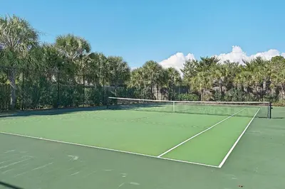 a tennis court with a net on top of it at Celadon 1902 