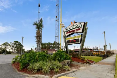 a sign for a soda shop on the side of a street at Commodore Resort #704 by Book That Condo in Panama City Beach