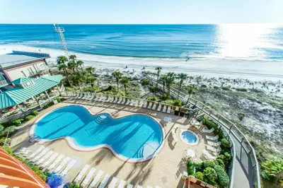 an aerial view of a resort with a swimming pool and the beach at Hidden Dunes 402 in Panama City Beach