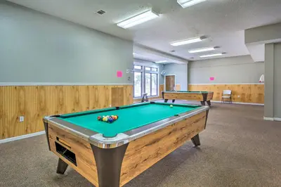 a billiard room with a pool table in it at PCB Resort Condo with Private Balcony and 3 Pools! in Panama City Beach