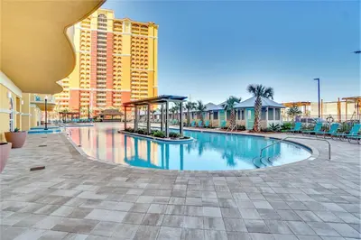 a swimming pool in the middle of a building at Calypso Resort Tower 3 by Panhandle Getaways in Panama City Beach