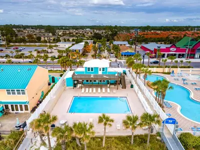 an aerial view of the pool at a resort at Gulf Highlands 170 by Book That Condo in Panama City Beach