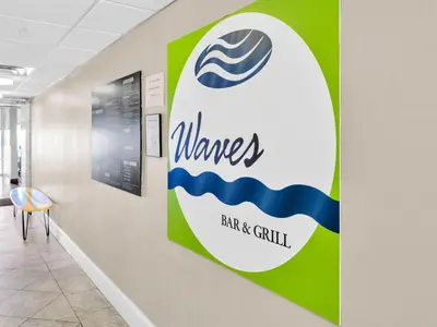 a sign on a wall in a hallway at Tidewater 302 in Panama City Beach