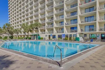 a large swimming pool in front of a hotel at The Summit 1323 in Panama City Beach