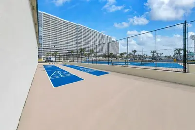a view of a swimming pool with a building at Sunbird 412E in Panama City Beach
