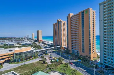an aerial view of a city with tall buildings and the ocean at Splash Beach Resort by Panhandle Getaways in Panama City Beach