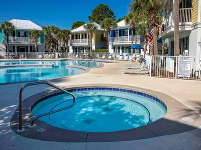 a large swimming pool in front of a resort at Bungalows at Seagrove #132 - Kruks Fanta Sea in Seagrove Beach