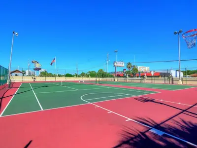 a tennis court with a net on top of it at Summit Beach Resort #915 in Panama City Beach