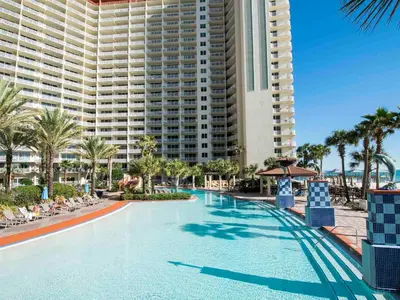a large swimming pool in front of a large building at Shores of Panama #1611 in Panama City Beach