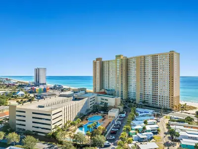 an aerial view of a city with the beach and buildings at Emerald Beach #1030 in Panama City Beach
