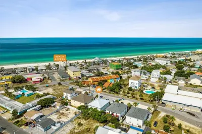 an aerial view of a city and the beach at Top Shelf 47 Unit C in Panama City Beach