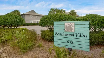 a sign for beachwood villas in front of a house at Beachwood Villas 1D in Santa Rosa Beach