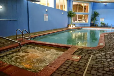 a large swimming pool in a building with a pool at Shores of Panama 620-Sleeps 8, Free Fun! Reserved Parking Space! Updated! condo in Panama City Beach