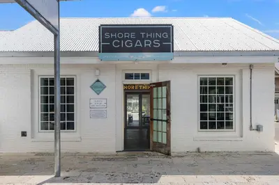 a store with a sign that reads store things cleaners at Luxury Home in Palmeira Village w Private Pool, Steps to Beach for 12! in Santa Rosa Beach
