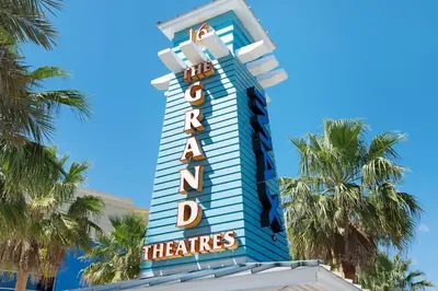 a sign for the anaheim theatres hotel at Directly On The Beach! First Floor Sundeck! Near Pier Park! Sleeps 6! in Panama City Beach