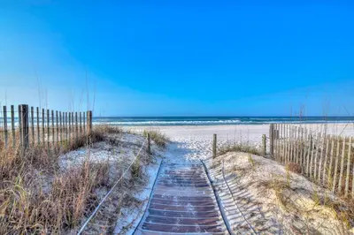 a path to the beach with snow on the sand at Continental 319-320 in Panama City Beach