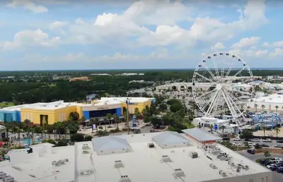 an aerial view of a amusement park with a ferris wheel at Sunbird 709W Beach Life in Panama City Beach